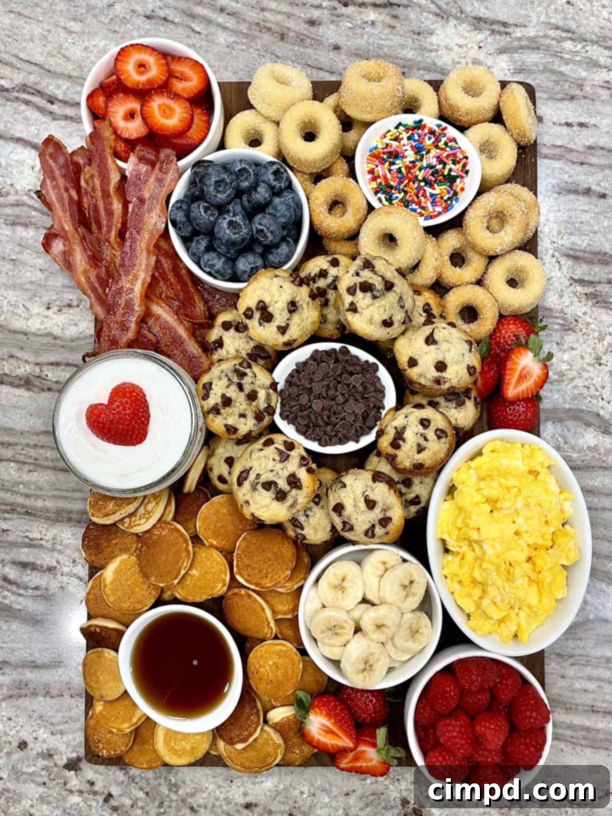 Vibrant and inviting Kid-Friendly Breakfast Board, bursting with sweet and savory delights for children.