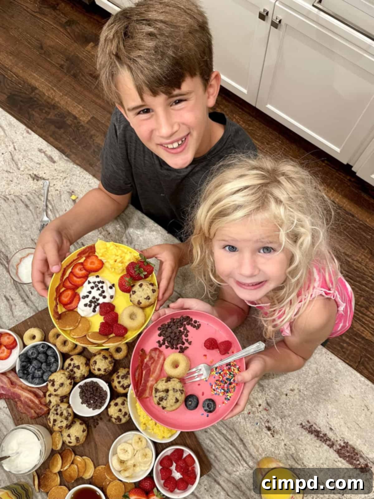 Close-up of a diverse Kid-Friendly Breakfast Board with various sweet and savory options.