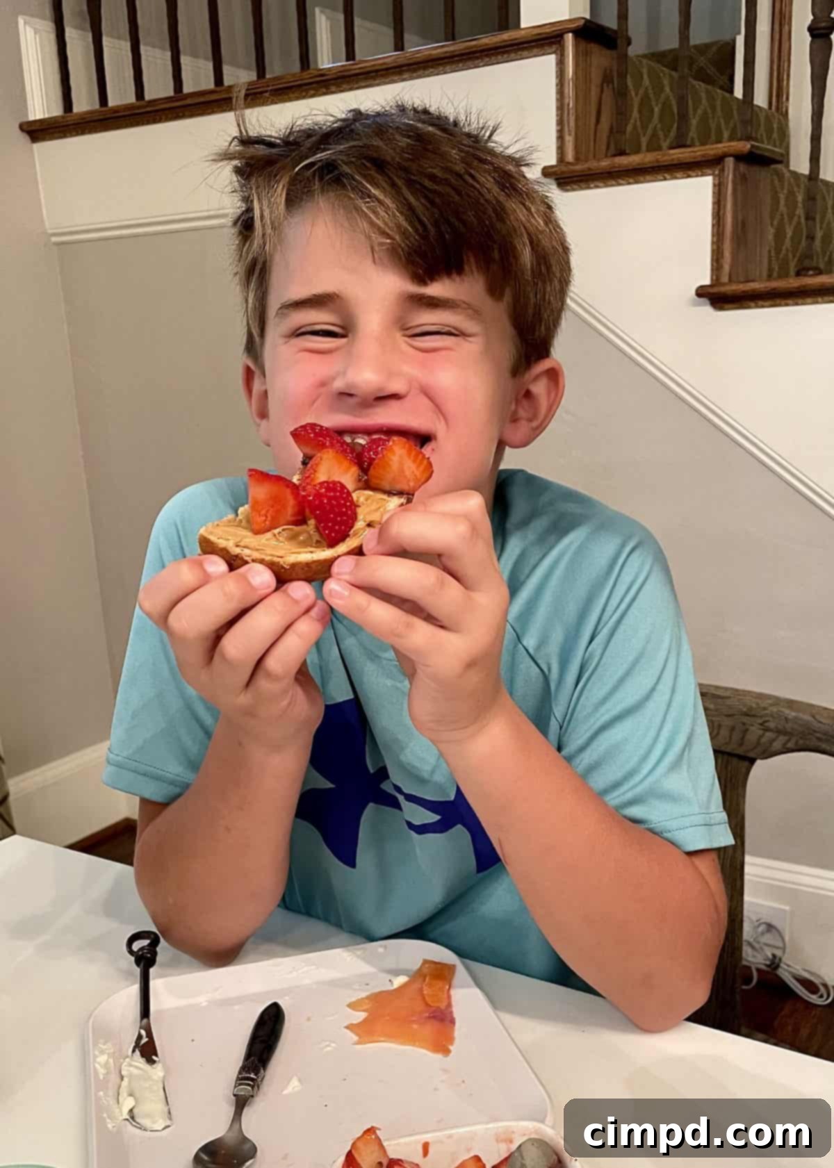 Close-up of a vibrant Bagel Board with fresh fruit, bagels, and assorted spreads ready for a family brunch