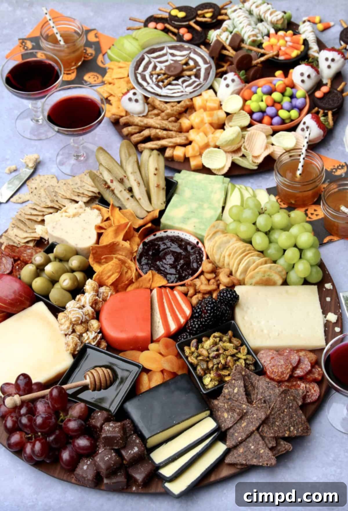 Another view of the Halloween Cheese Board, displaying an abundance of various spooky and delicious snacks, by The BakerMama.