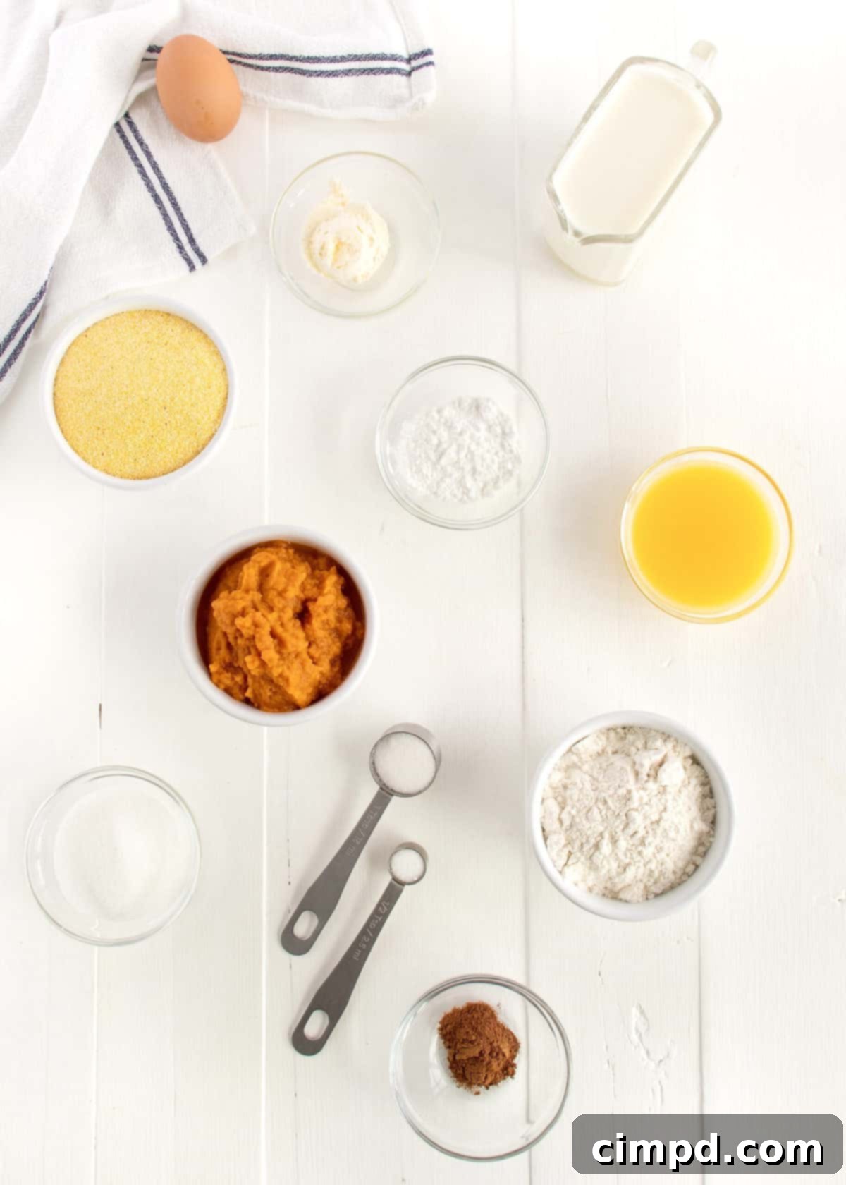 Spiced Pumpkin Cornbread 4 A slice of moist Pumpkin Cornbread revealing its tender crumb.