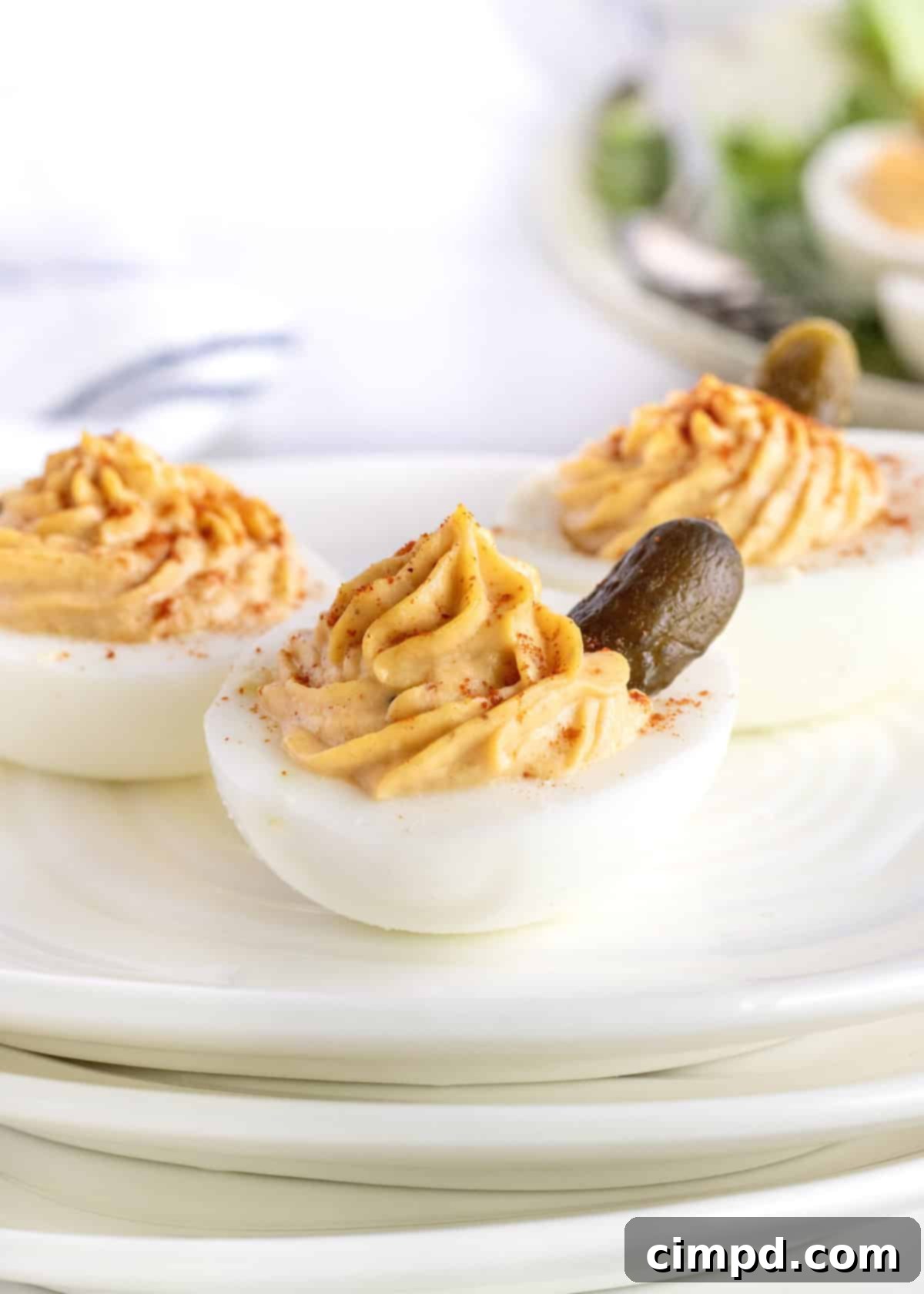 Autumnal Pumpkin Spiced Deviled Eggs 4 Pumpkin Spiced Deviled Eggs by The BakerMama