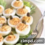 Autumnal Pumpkin Spiced Deviled Eggs 9 Pumpkin Spiced Deviled Eggs by The BakerMama