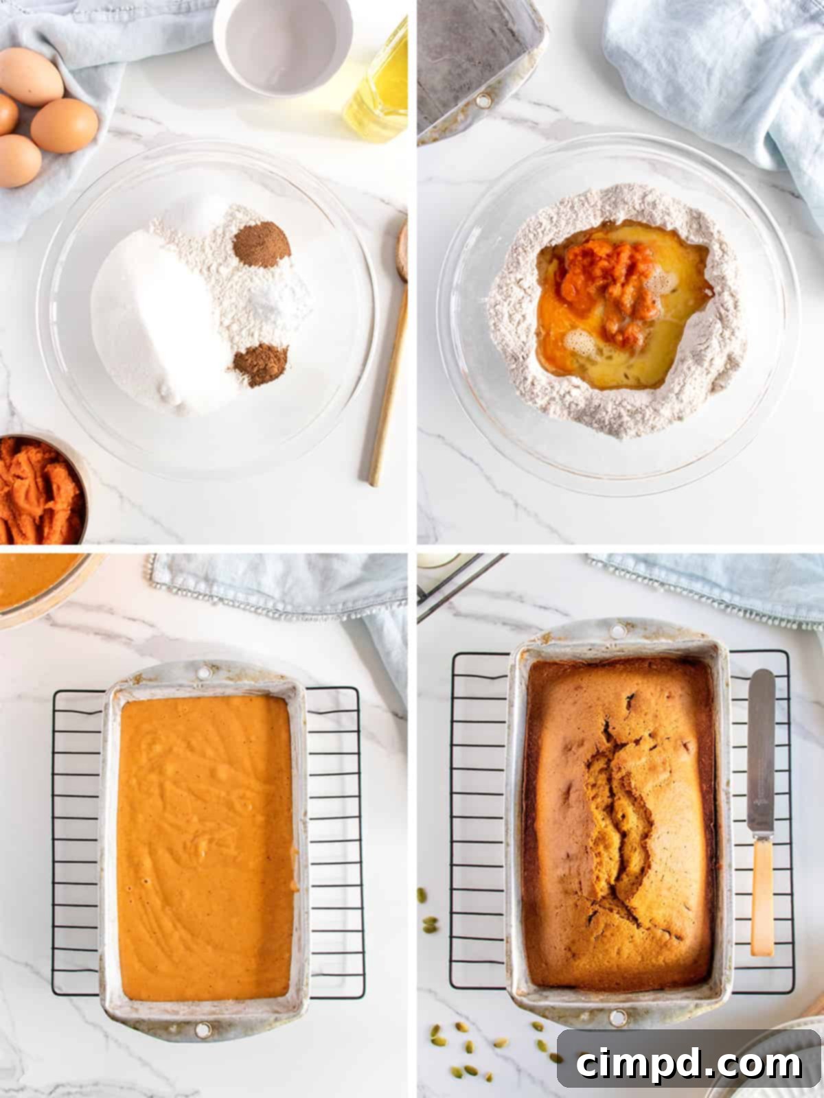 Two loaves of freshly baked Perfect Pumpkin Bread on a cooling rack