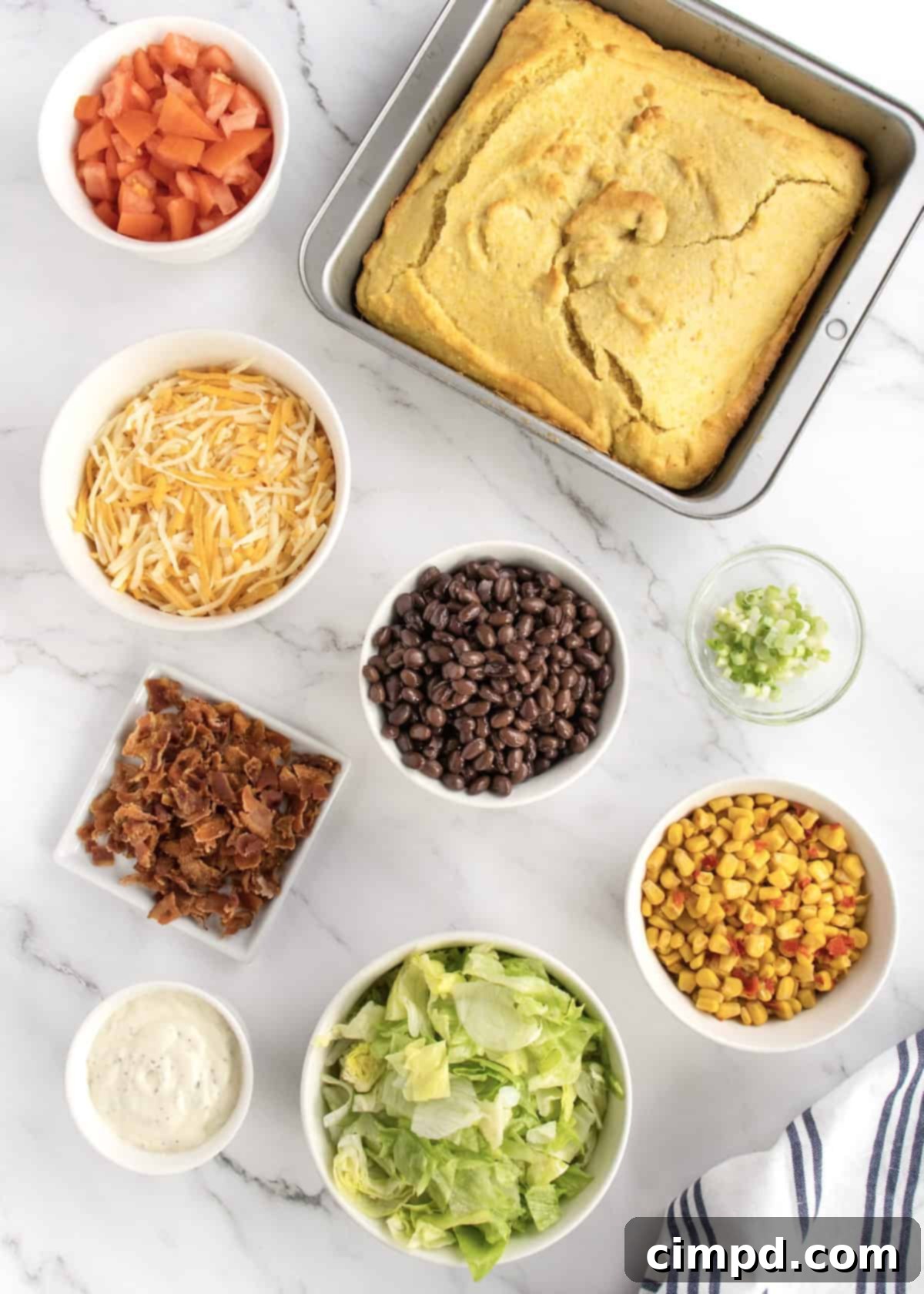 Southern Stacked Cornbread Medley 5 All the fresh ingredients for layered cornbread salad laid out beautifully.