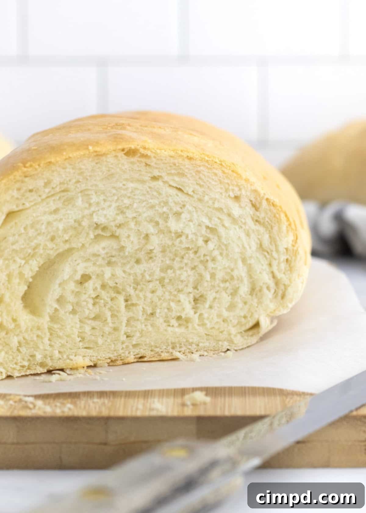 Beautifully sliced 5-Ingredient Homemade French Bread, revealing its airy interior, ready for serving or enjoyment.