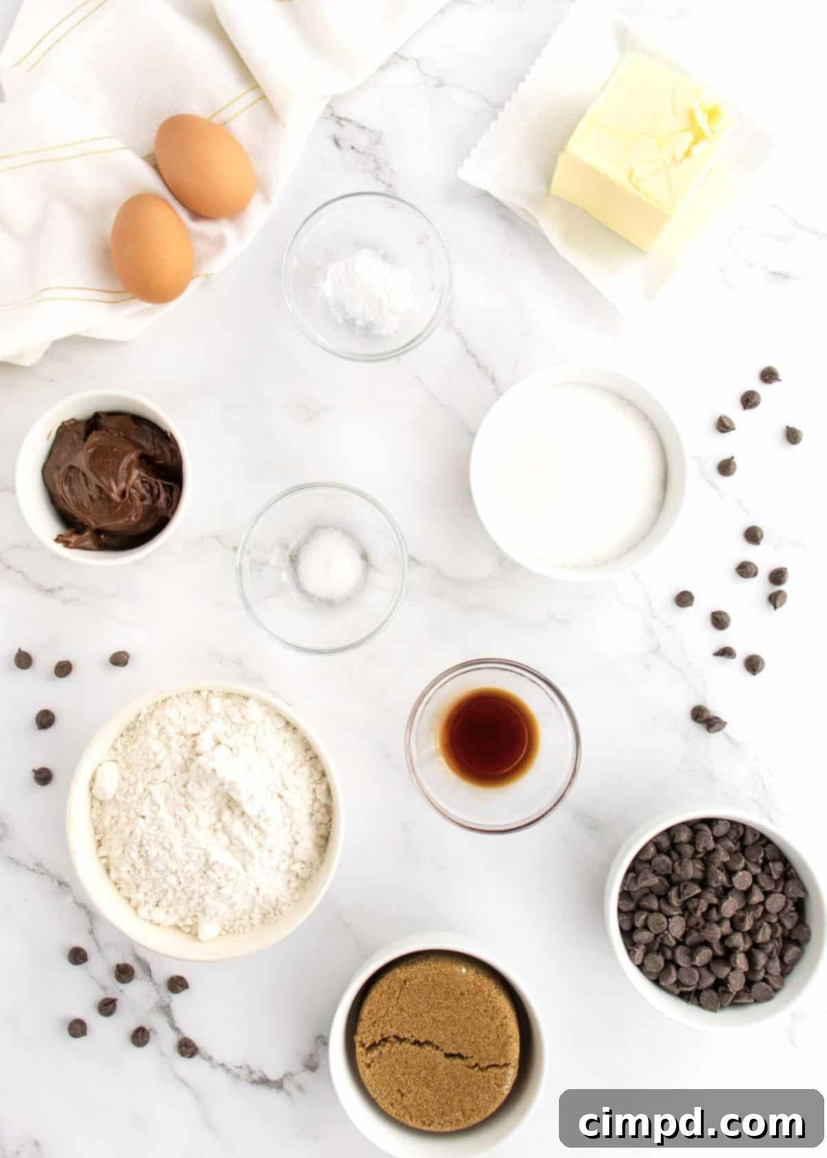 Close-up of Chocolate Chip Cookie Cake dough in a mixer bowl before baking