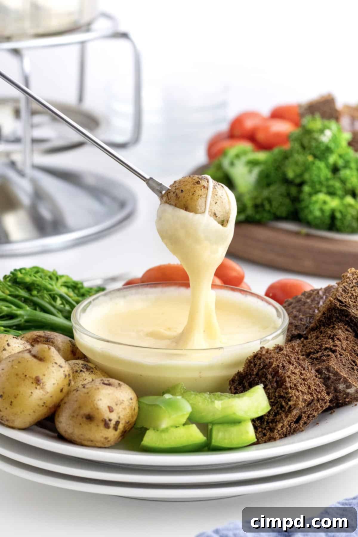 Three Cheese Fondue by The BakerMama