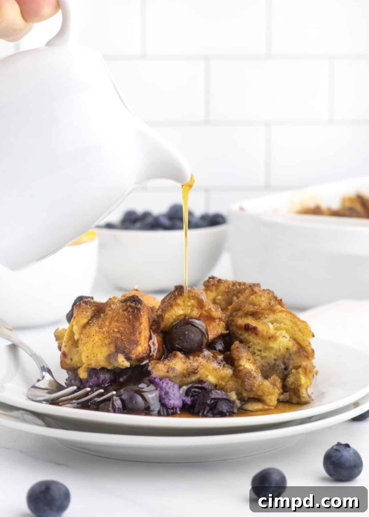 Basket of fresh blueberries, suggesting the main ingredient of the casserole.