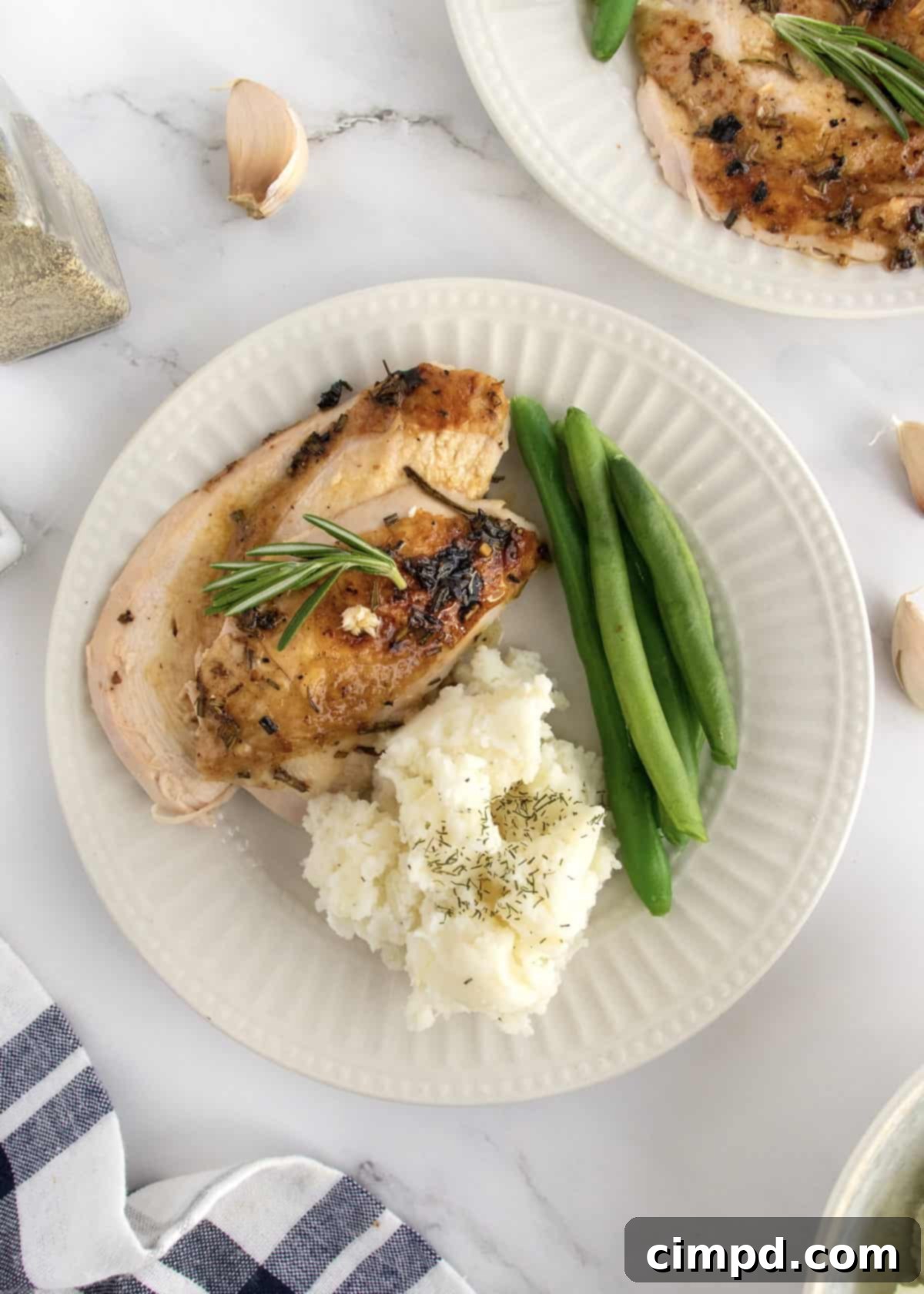 Close-up of crispy skin on Roasted Lemon Garlic Rosemary Chicken