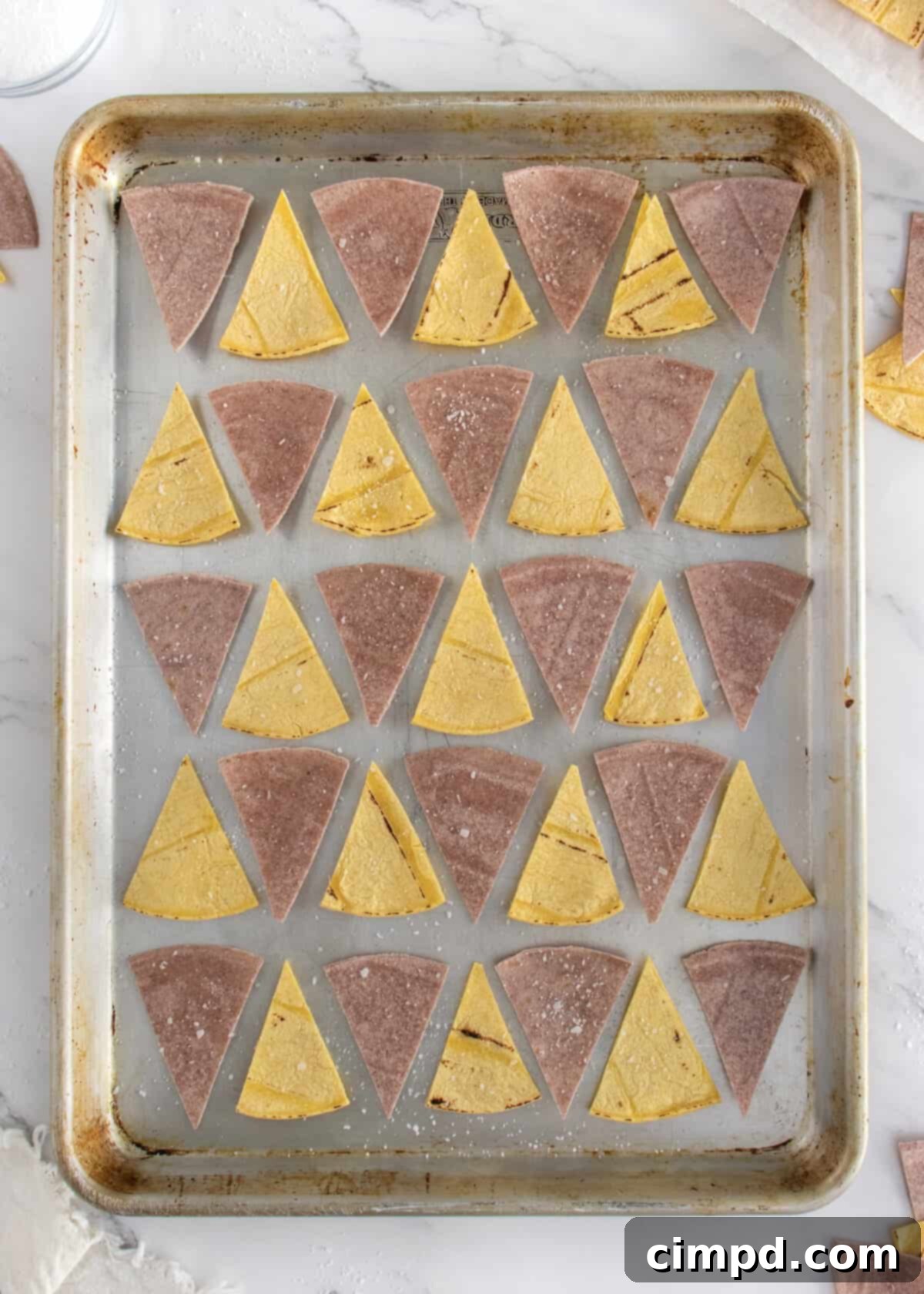 Baked Corn Tortilla Chips Cooling on Sheet