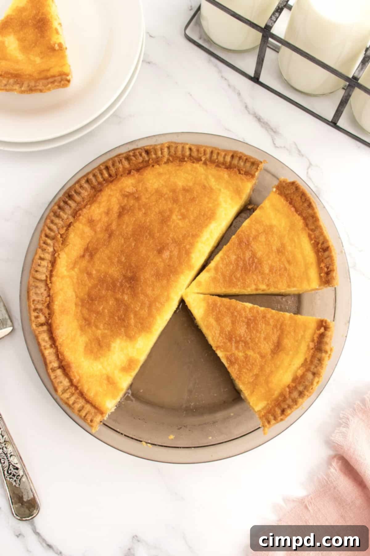 Velvet Buttermilk Bliss 6 A beautifully baked Buttermilk Pie, garnished simply for serving by The BakerMama