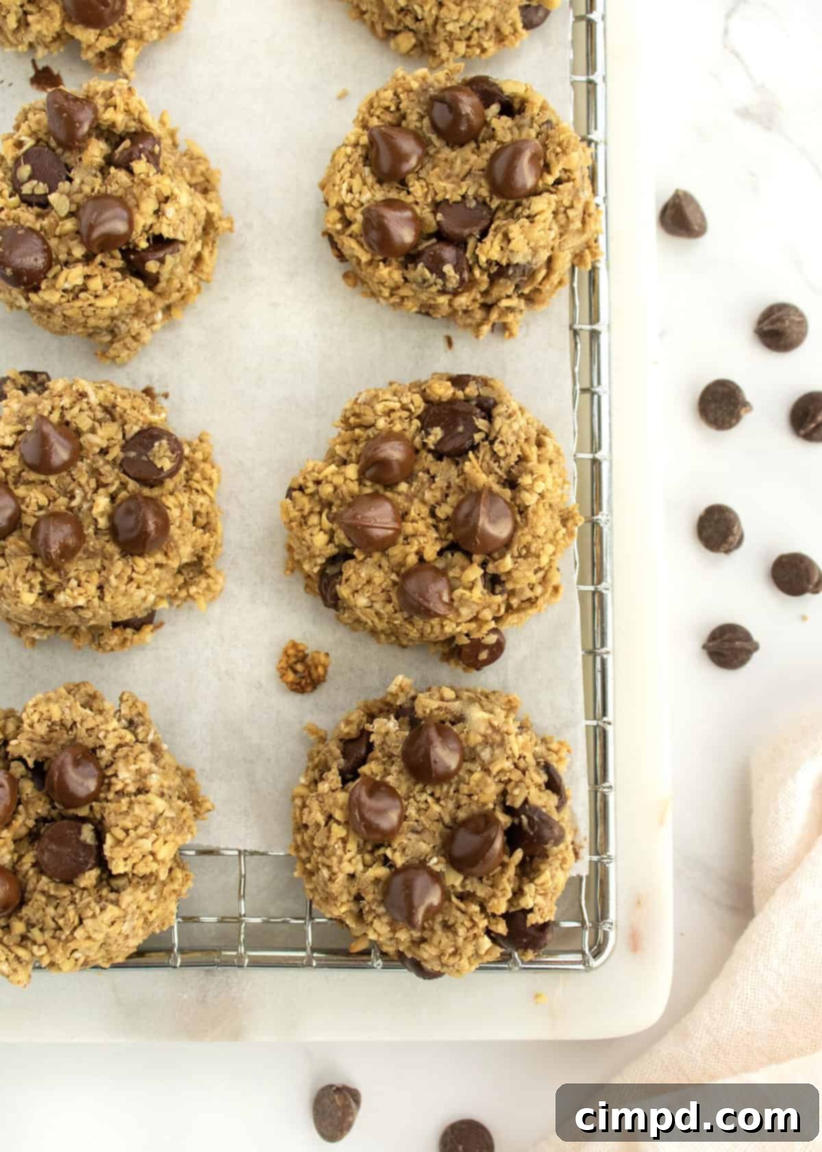 A plate of 4-Ingredient Steel Cut Oat Cookies with milk
