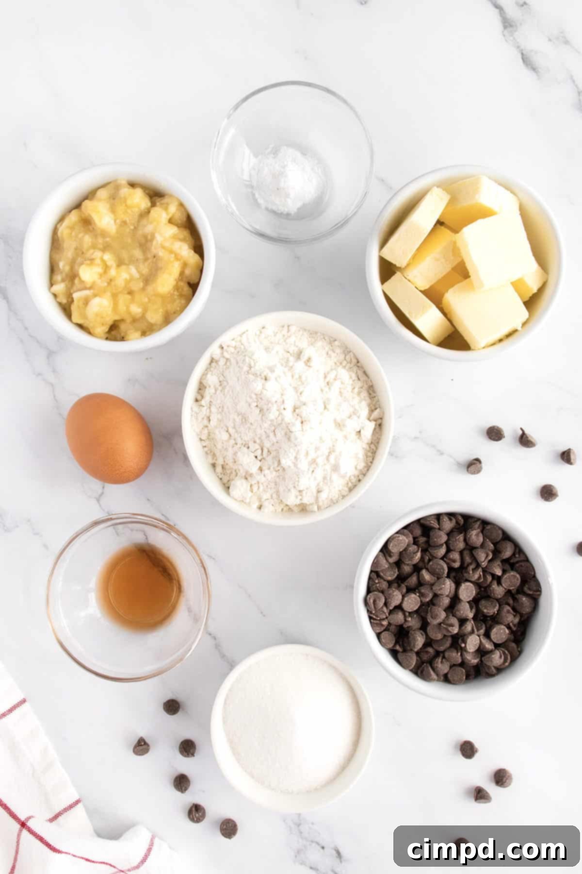 Banana Chocolate Chip Muffins by The BakerMama