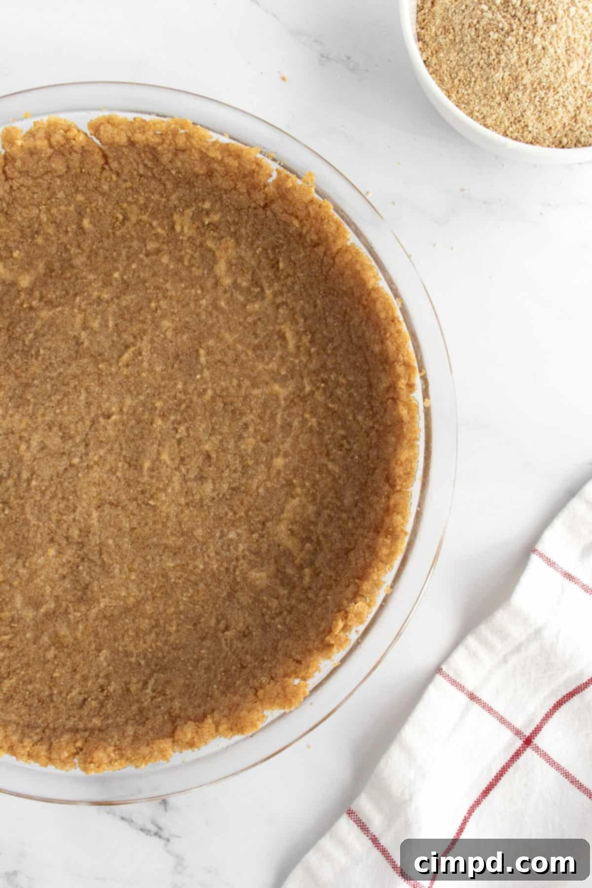 Crafting the Perfect Graham Cracker Crust 6 How to Make a Graham Cracker Crust by The BakerMama