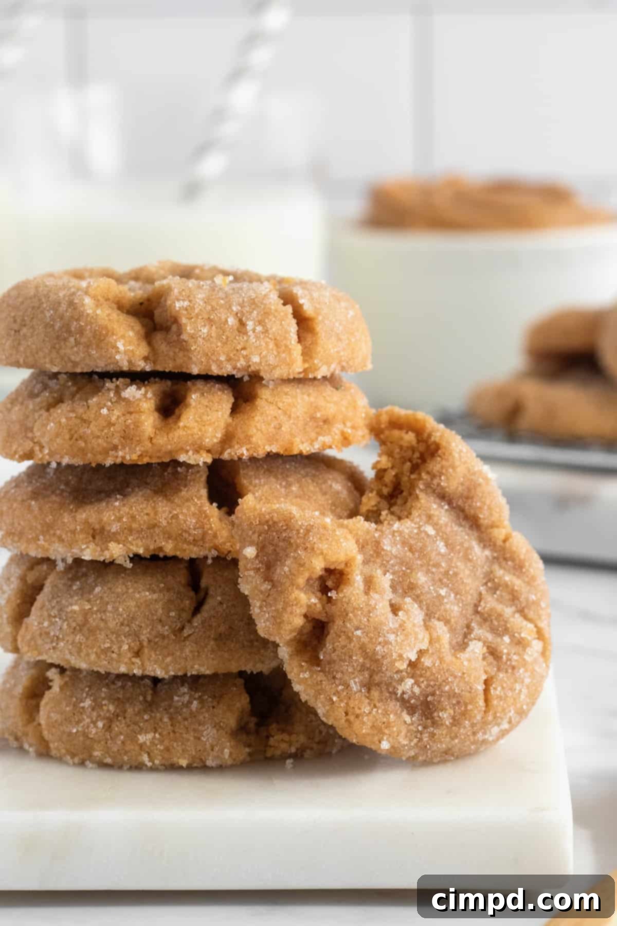 Effortless 4 Ingredient Flourless Peanut Butter Cookies 3 Close-up of freshly baked 4-Ingredient Flourless Peanut Butter Cookies on a cooling rack