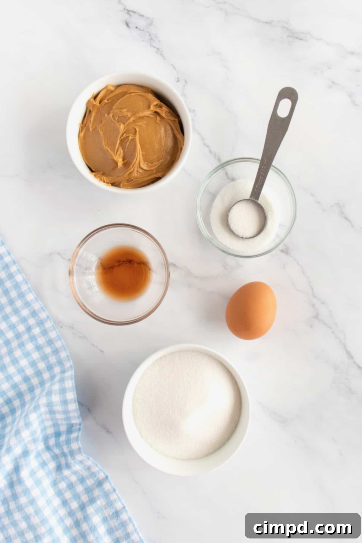 Effortless 4 Ingredient Flourless Peanut Butter Cookies 4 Ingredients for 4-Ingredient Flourless Peanut Butter Cookies laid out