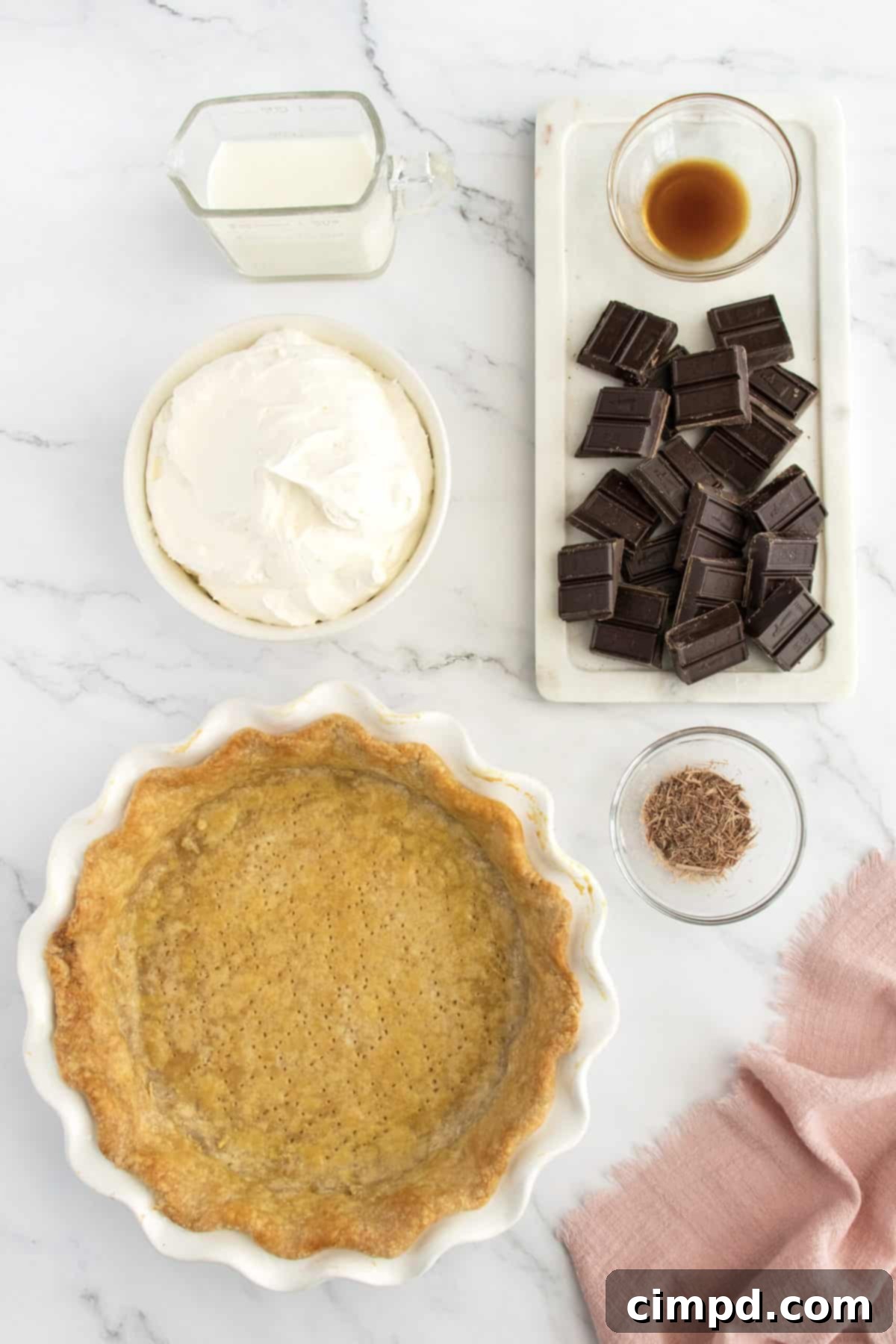 Three slices of Chocolate Cream Pie, perfectly portioned and ready to be served, revealing the distinct layers.