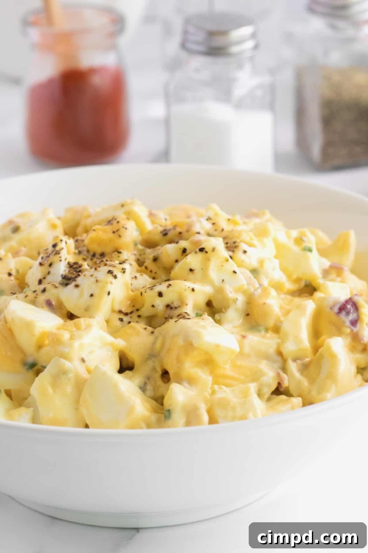 Perfectly Creamy Egg Salad 6 Egg Salad served on a rustic board, ready for sharing.