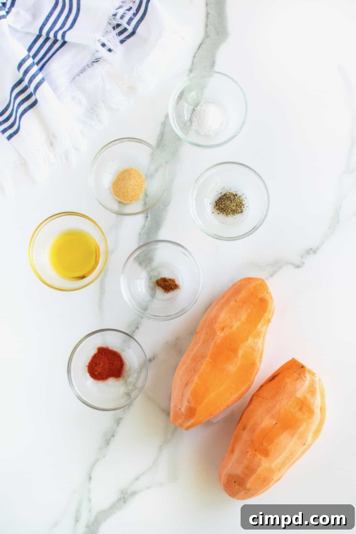 Ingredients laid out for making baked sweet potato fries