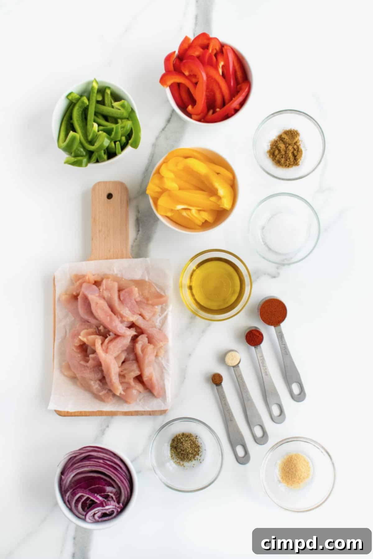 Plated Sheet Pan Chicken Fajitas with toppings, ready to be enjoyed.