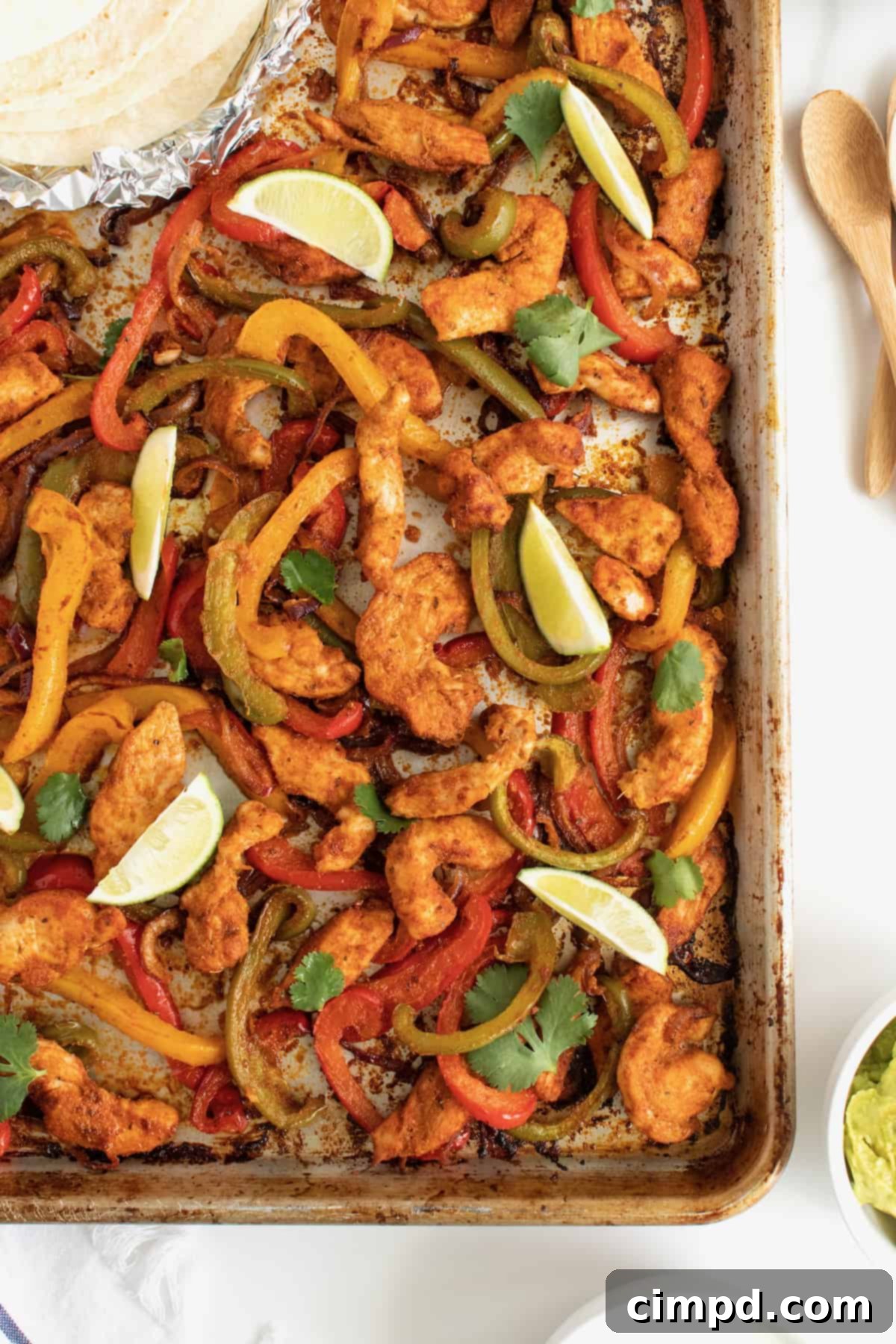 Another appealing shot of the Sheet Pan Chicken Fajitas, highlighting the textures and vibrant colors.