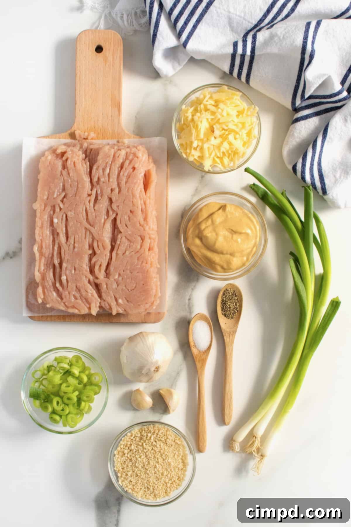 Fire-Kissed Turkey Burgers 4 A bowl of the prepared turkey burger mixture, showing the mix of ground turkey, cheese, and green onions.