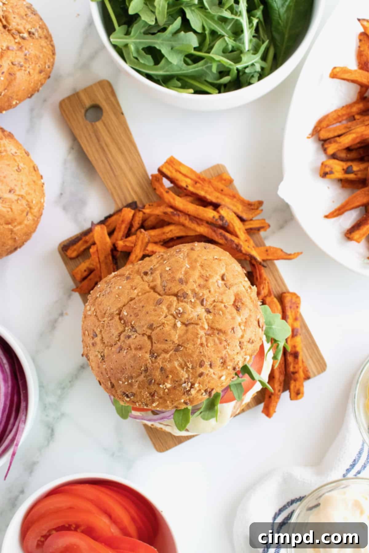 Fire-Kissed Turkey Burgers 7 A collection of diverse dishes made with ground turkey, including lasagna, tacos, and chili, showcasing its versatility.