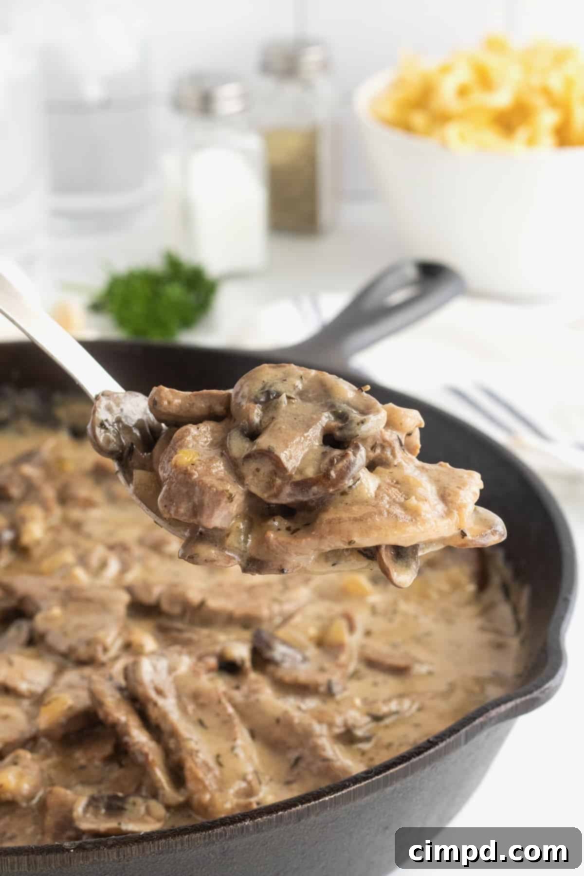 Simple Beef Stroganoff 7 Bowl of Beef Stroganoff with egg noodles and fresh parsley