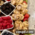 Mini Muffin and Cinnamon Roll Breakfast Board by The BakerMama