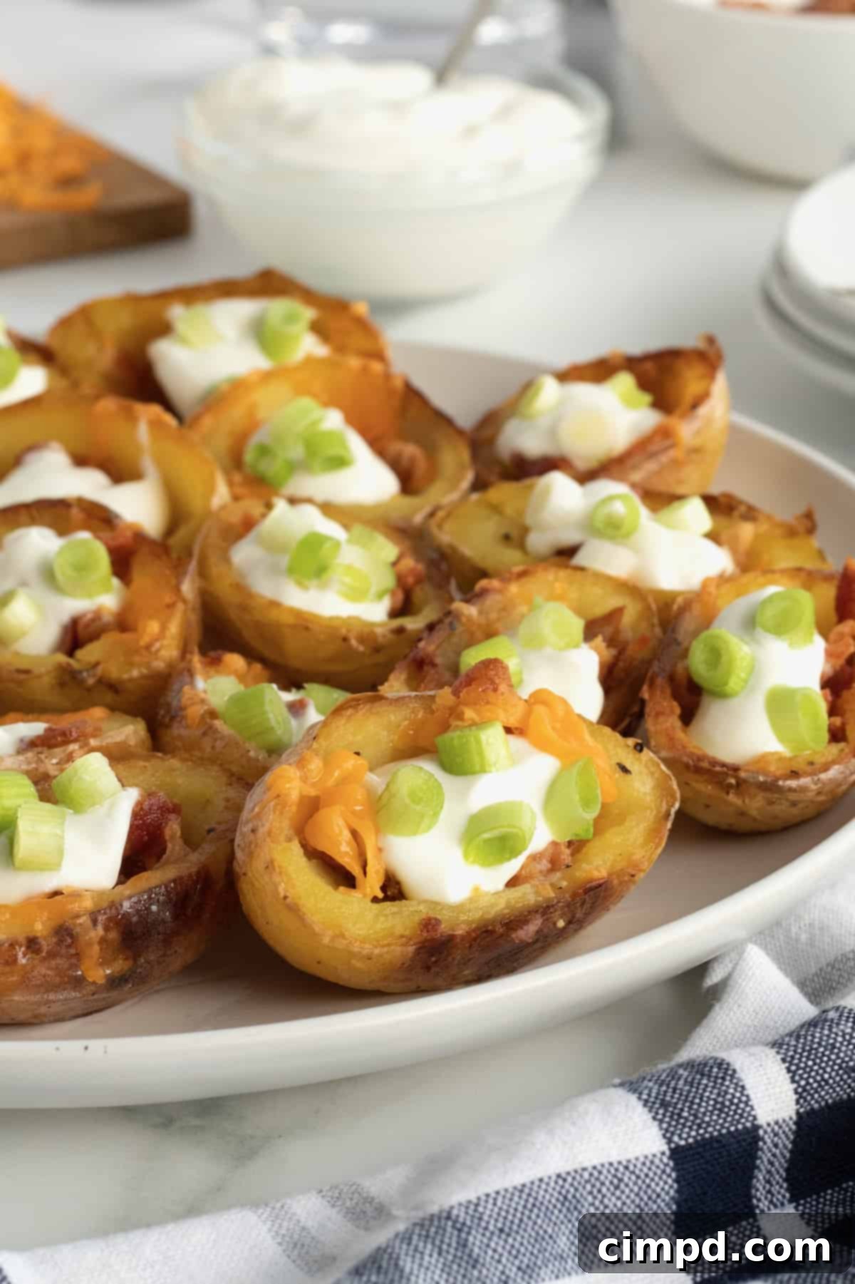 Touchdown Treats Ultimate Game Day Recipes 3 A platter of appetizing Mini Potato Skins, perfectly crisp and loaded with toppings, making for an excellent game day finger food.