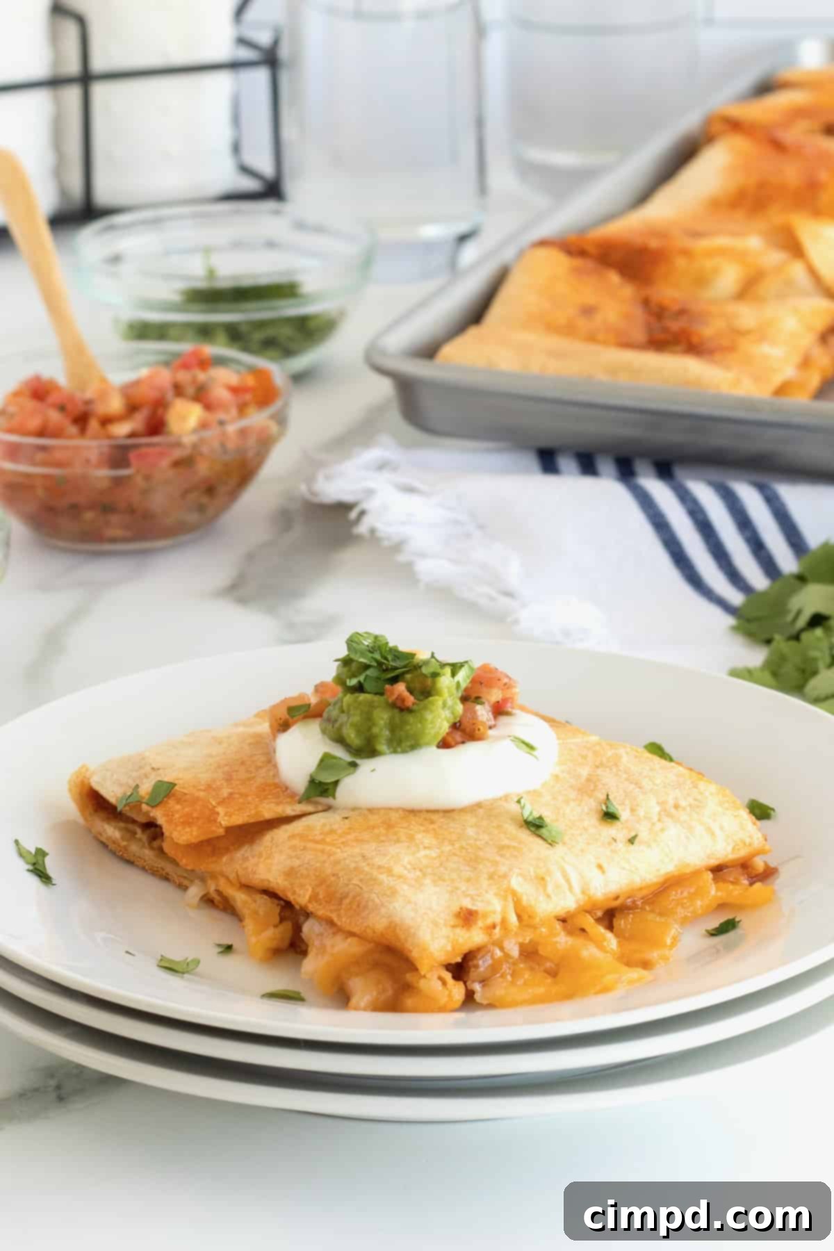 Close-up of Beef and Bean Sheet Pan Quesadilla with toppings