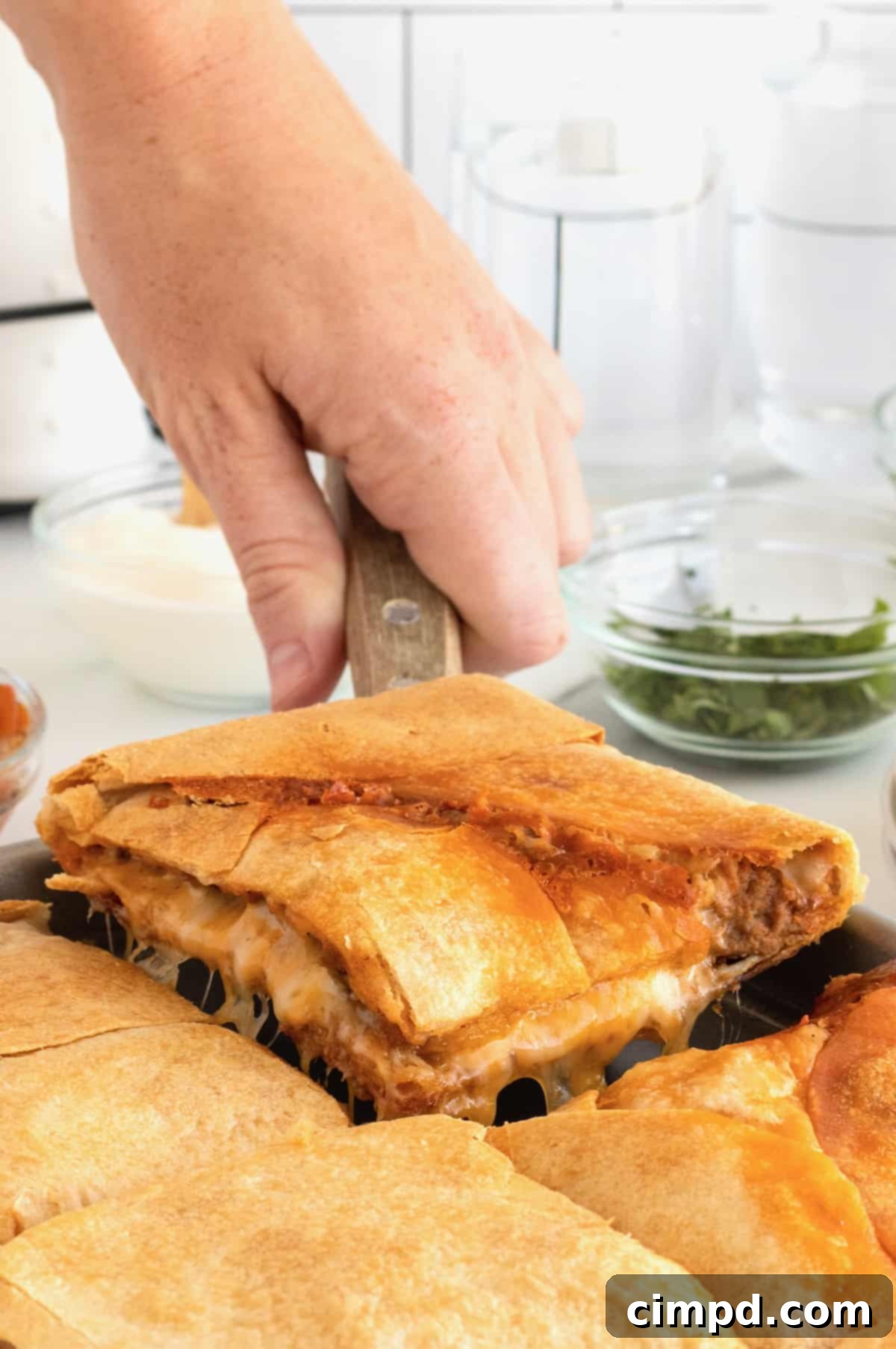 Cooked Beef and Bean Sheet Pan Quesadilla, ready to be cut