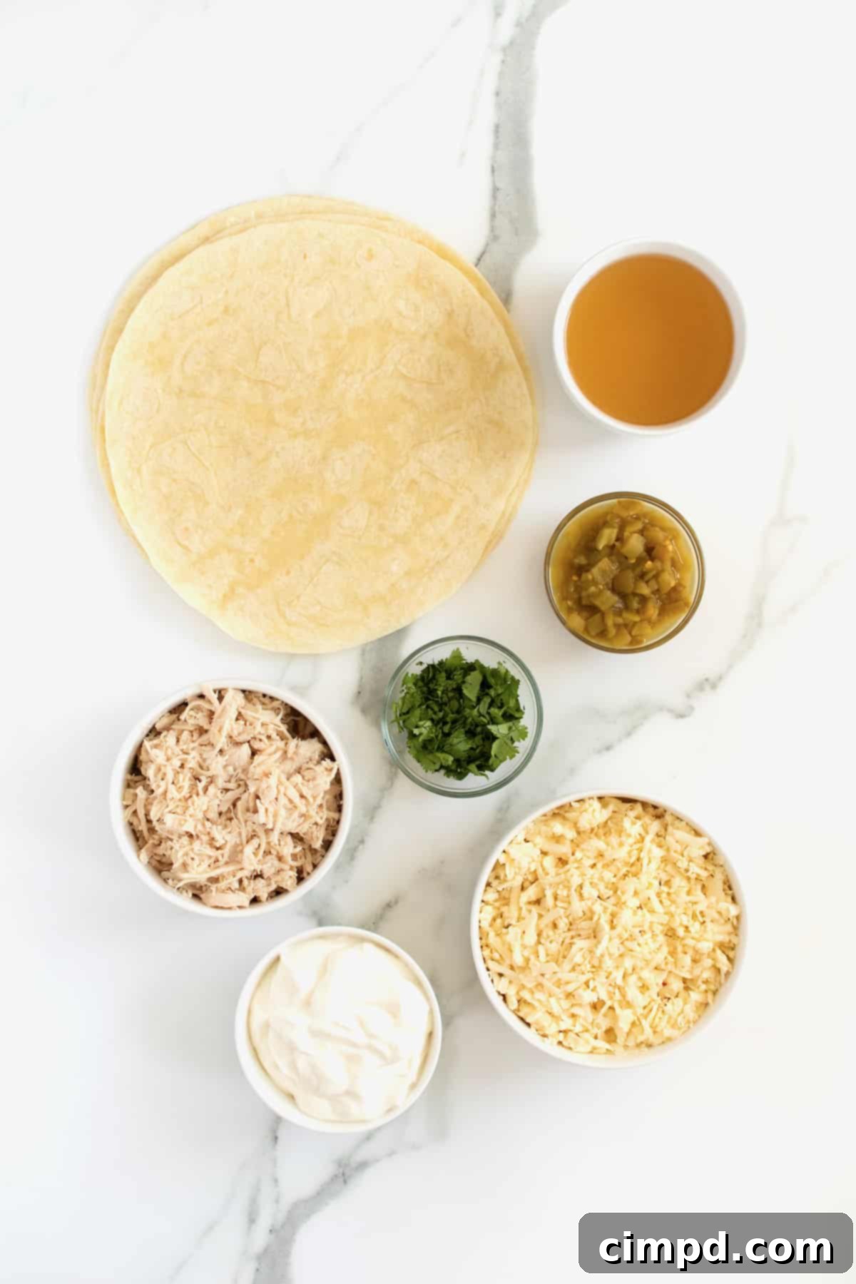 Velvet Chicken Enchiladas 4 Homemade chicken enchiladas with fresh cilantro garnish