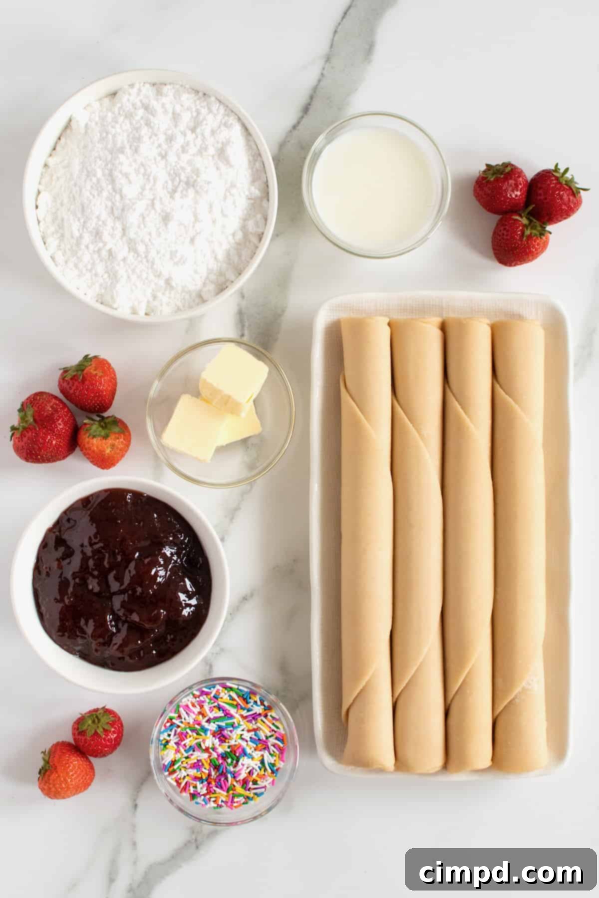 Easy Homemade Strawberry Sheet Pan Pop Tart 4 The array of simple, wholesome ingredients required to make a homemade sheet pan pop tart, including pie crusts, strawberry jam, butter, powdered sugar, milk, and colorful sprinkles.