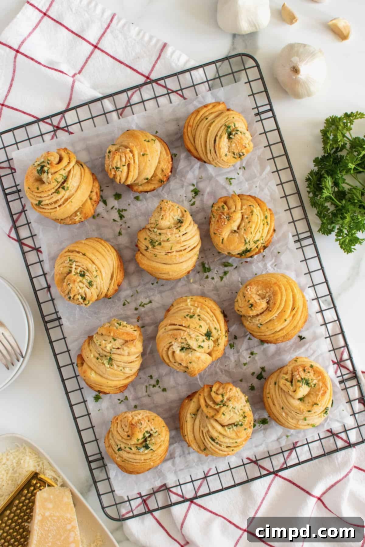 Garlic Parmesan Herb Cruffins by The BakerMama