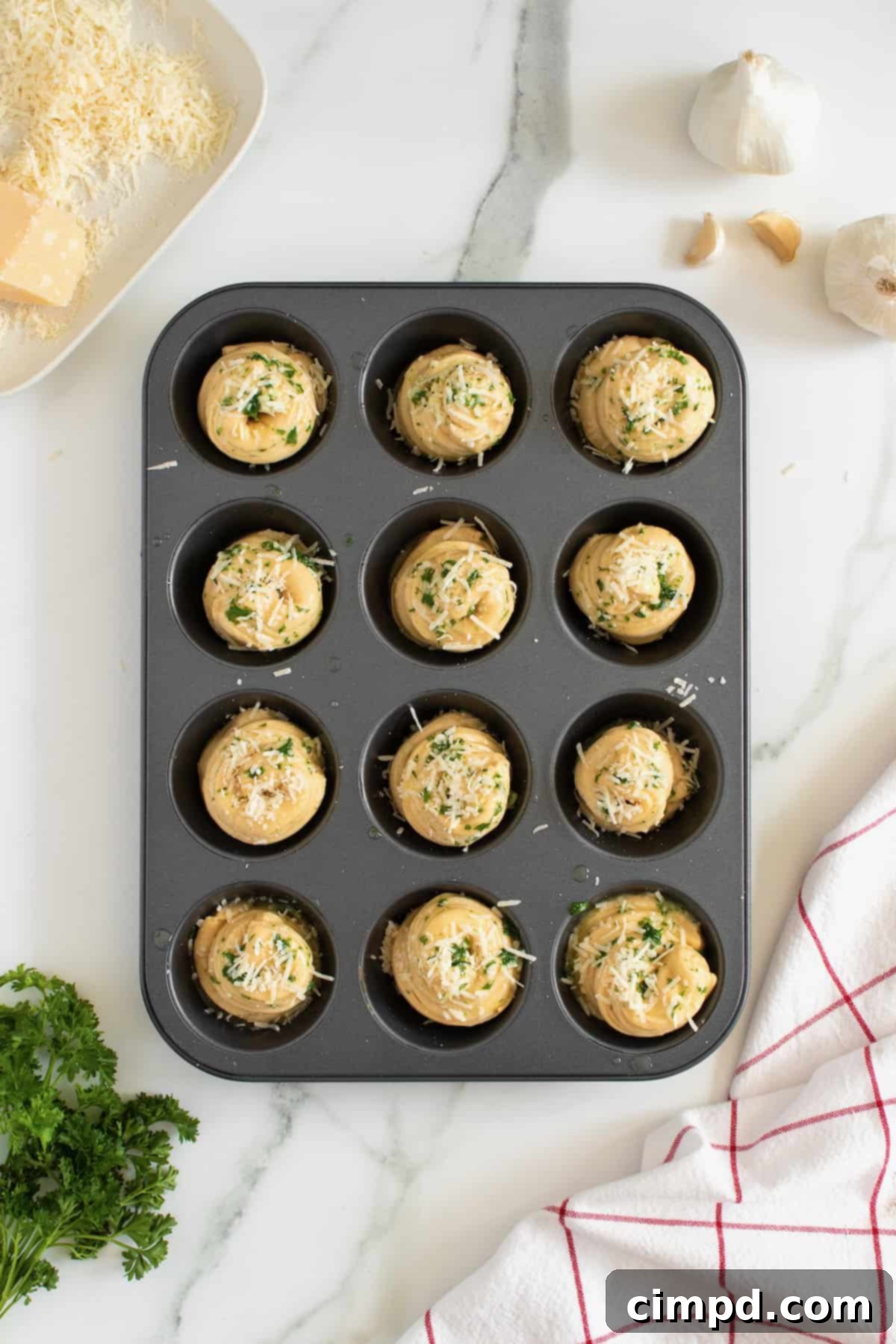 Garlic Parmesan Herb Cruffins by The BakerMama