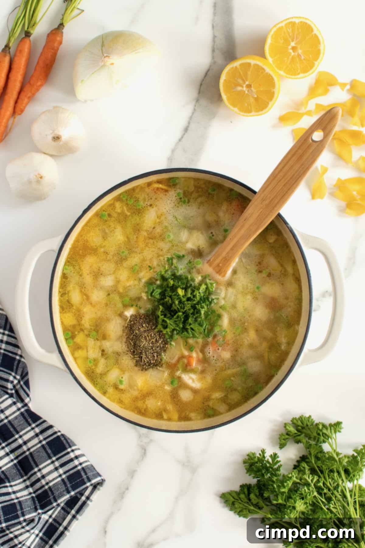 Finished homemade chicken noodle soup, ready to serve, by The BakerMama