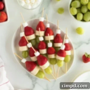 Grinch Fruit Skewers by The BakerMama