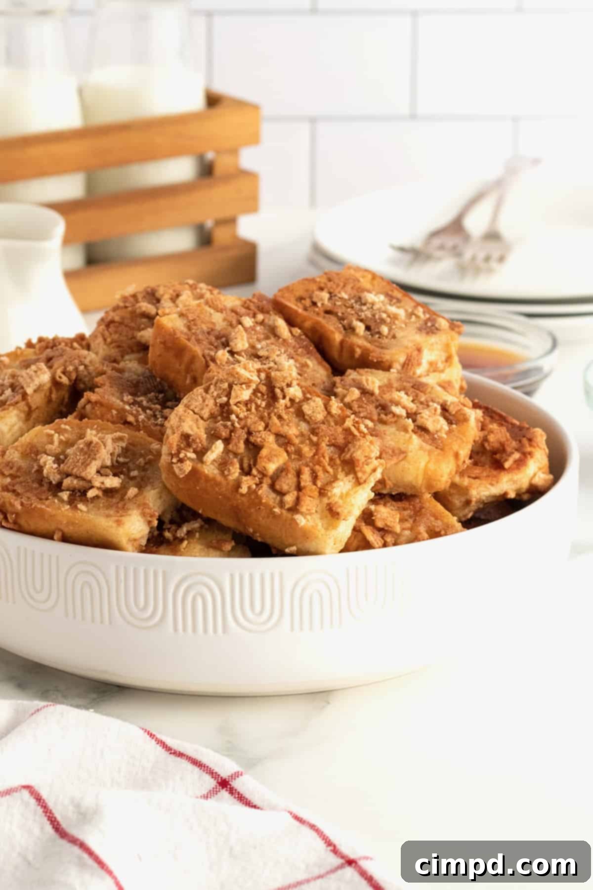 Cinnamon Toast Crunch French Toast Poppers 2 Cinnamon Toast Crunch French Toast Bites by The BakerMama