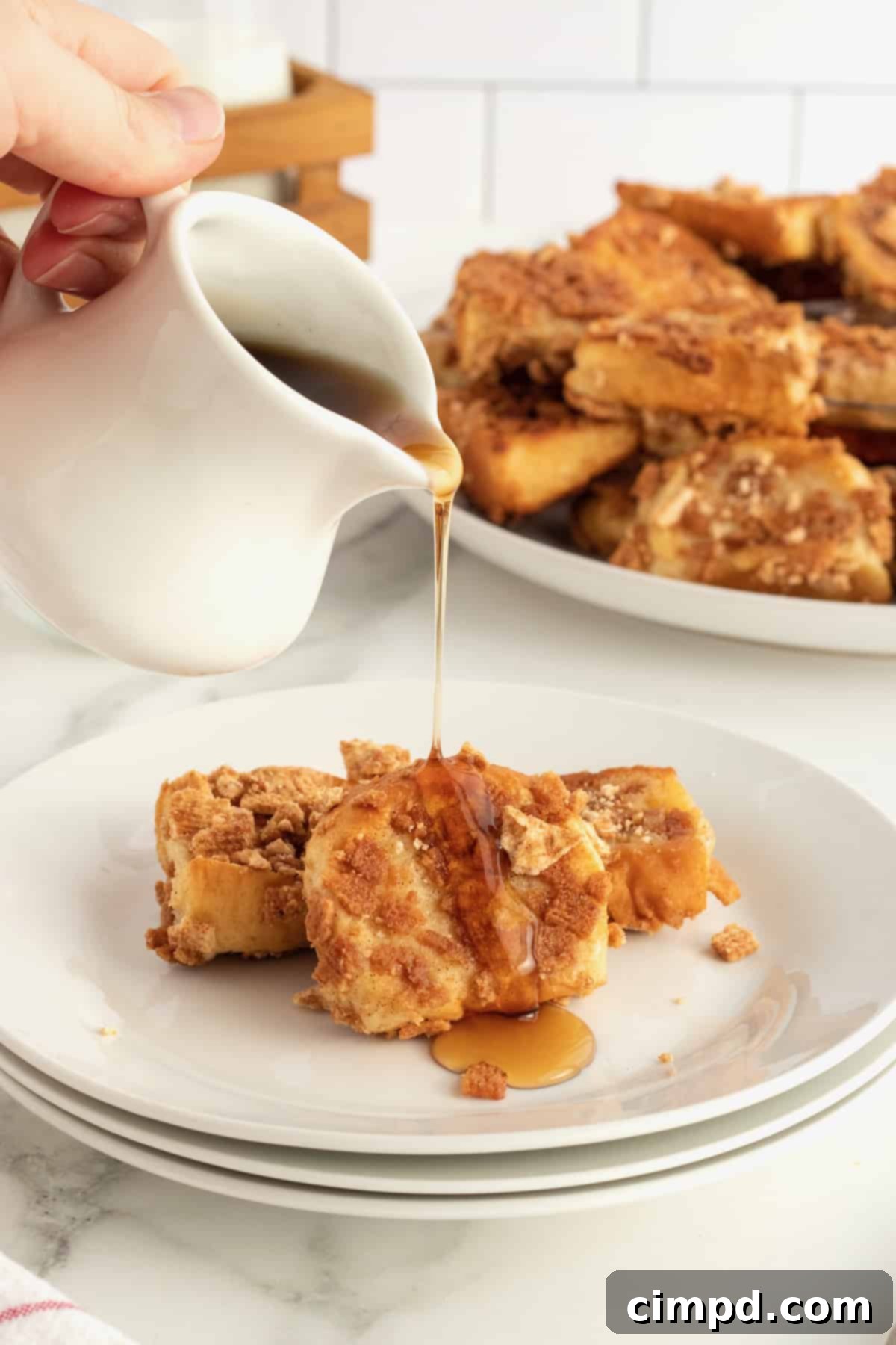 Cinnamon Toast Crunch French Toast Poppers 4 Cinnamon Toast Crunch French Toast Bites by The BakerMama
