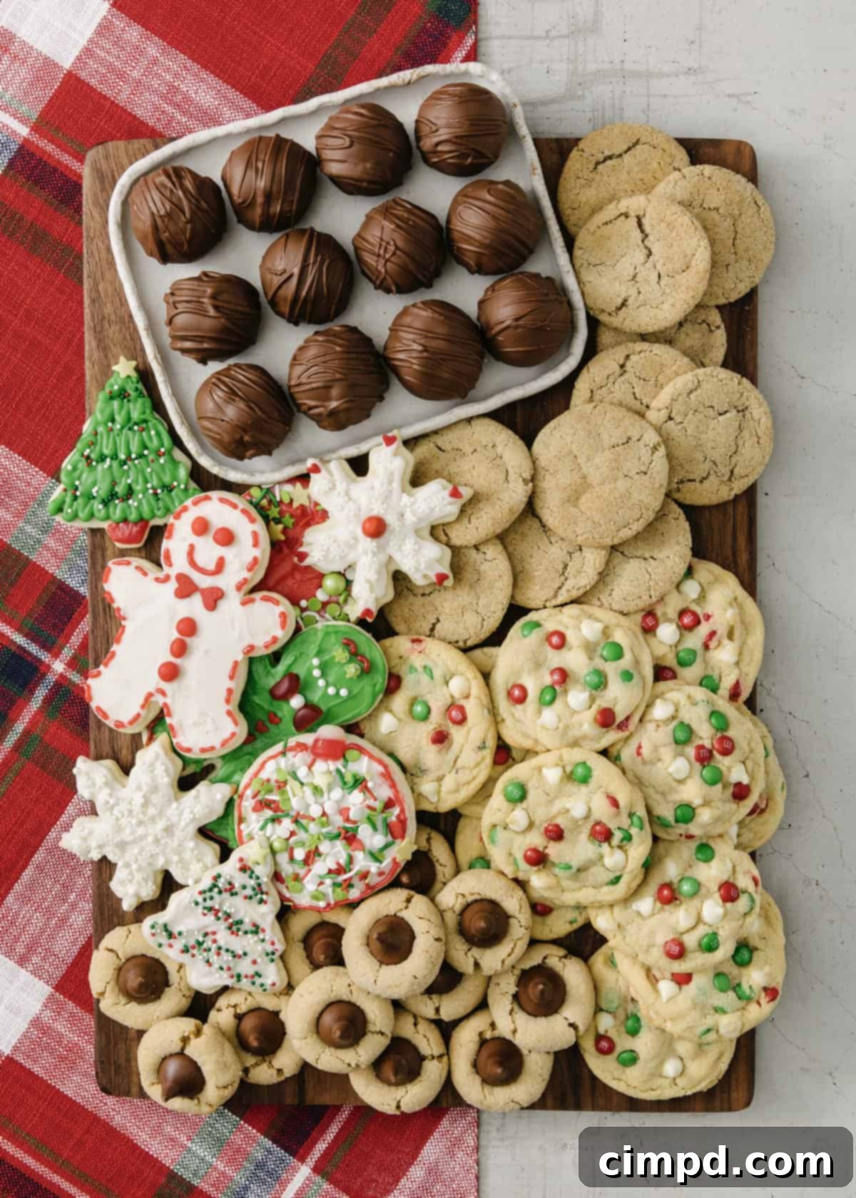 Holiday Cookie Exchange Spread_Cookies_Spectacular Spreads Cookbook - an impressive display of assorted holiday cookies, perfect for a festive gathering.