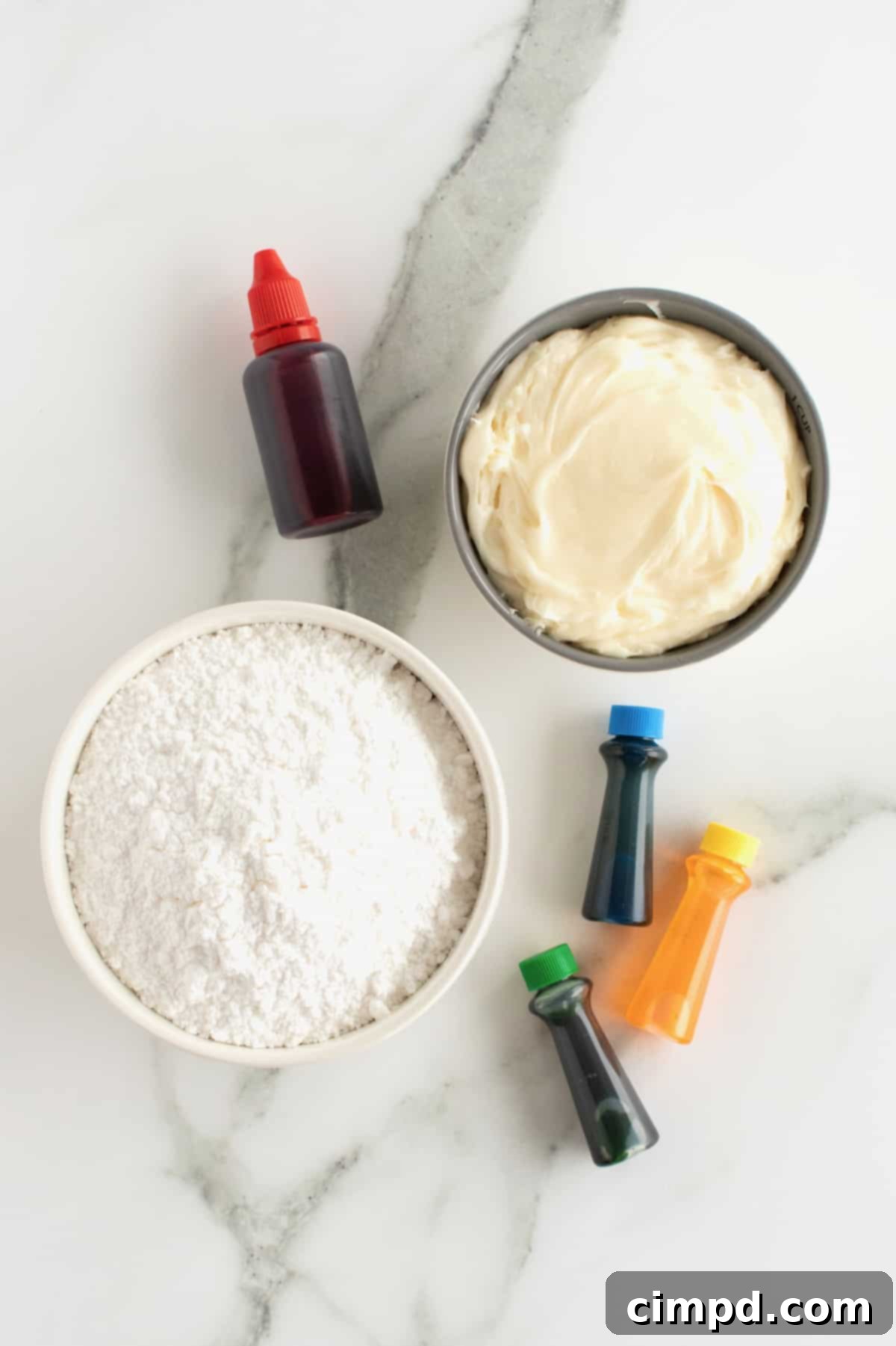 Ingredients for edible play dough: frosting, powdered sugar, food coloring