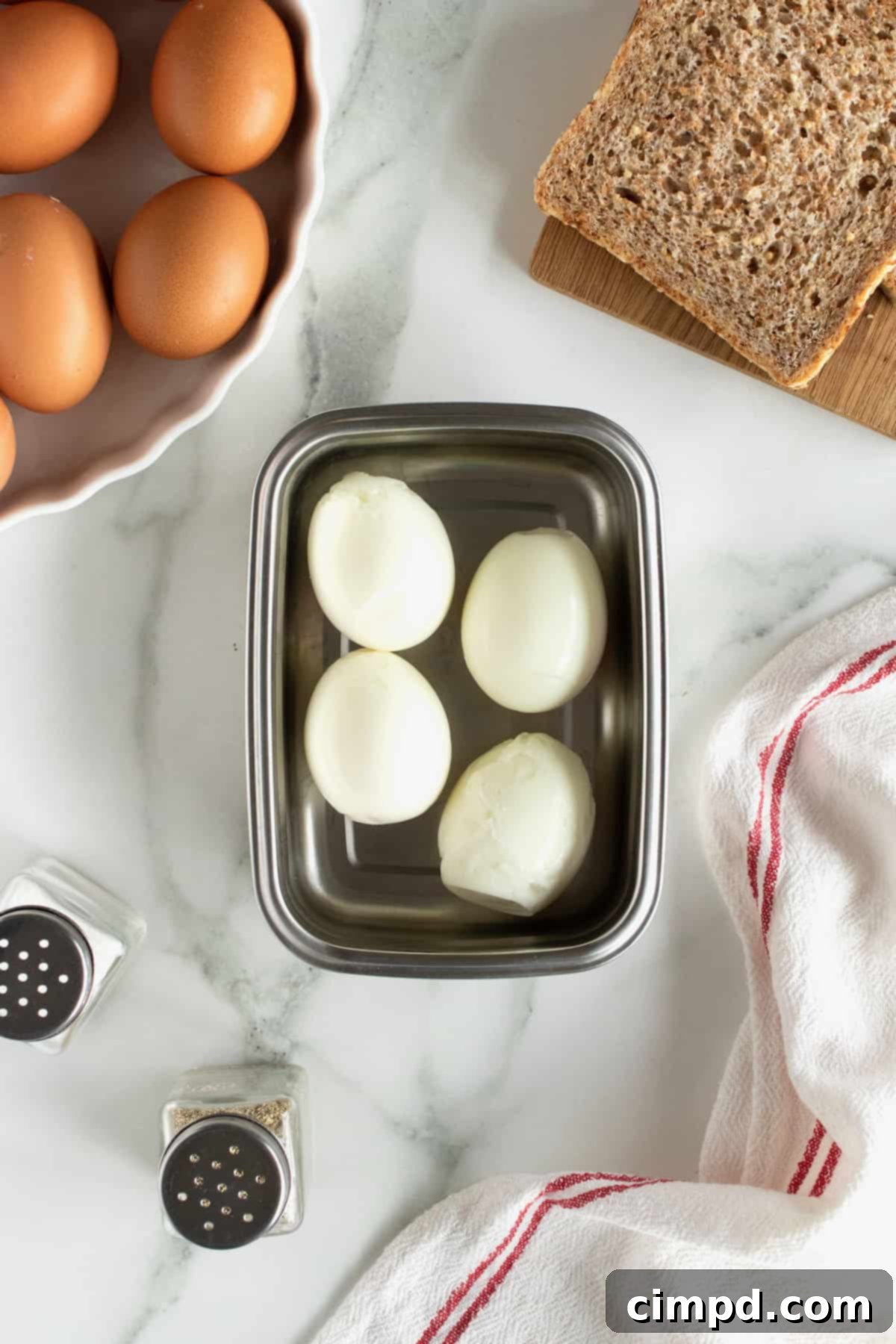 Soft-boiled eggs stored in a glass container