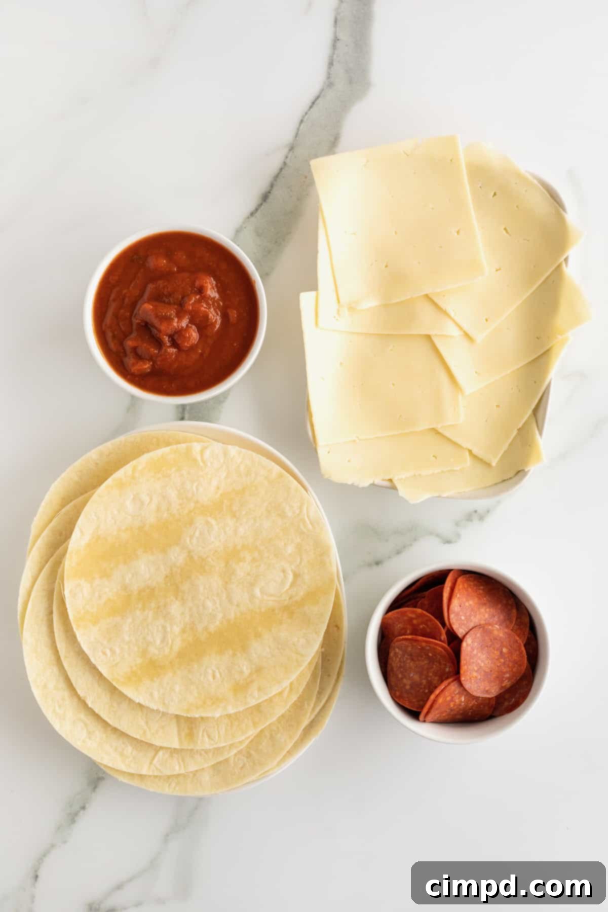 Heart Shaped Tortilla Pizzas by The BakerMama