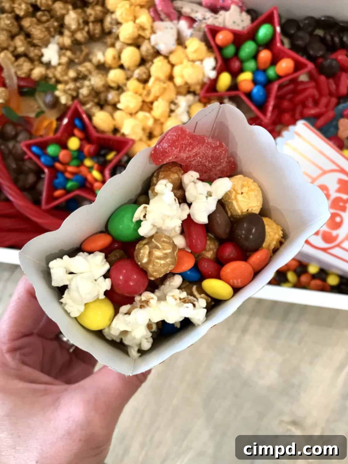 Movie Night Popcorn Board with a variety of snacks