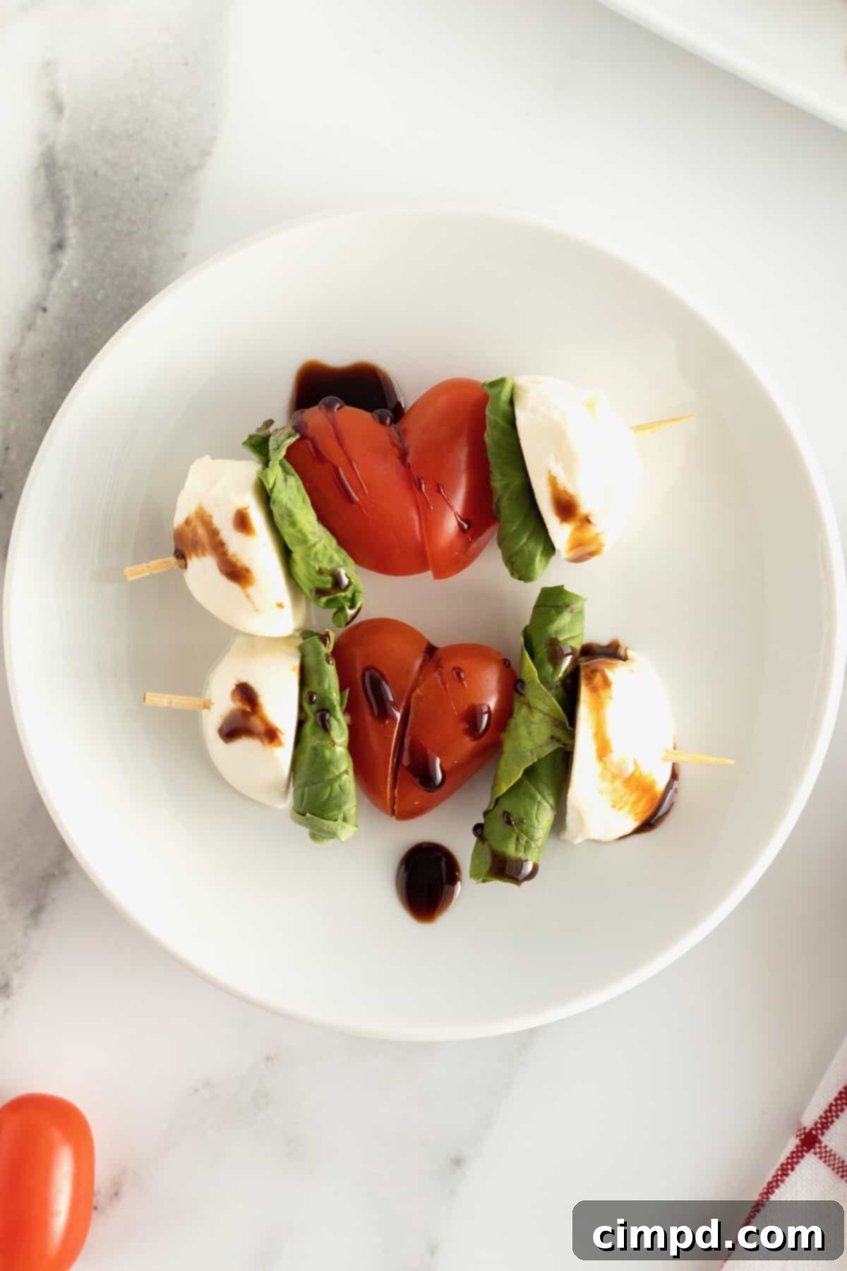 Assortment of Cupid's Caprese Skewers on a tray, ready to serve