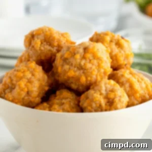 Irresistible Cheesy Sausage Bites 11 Easy Cheesy Sausage Balls by The BakerMama