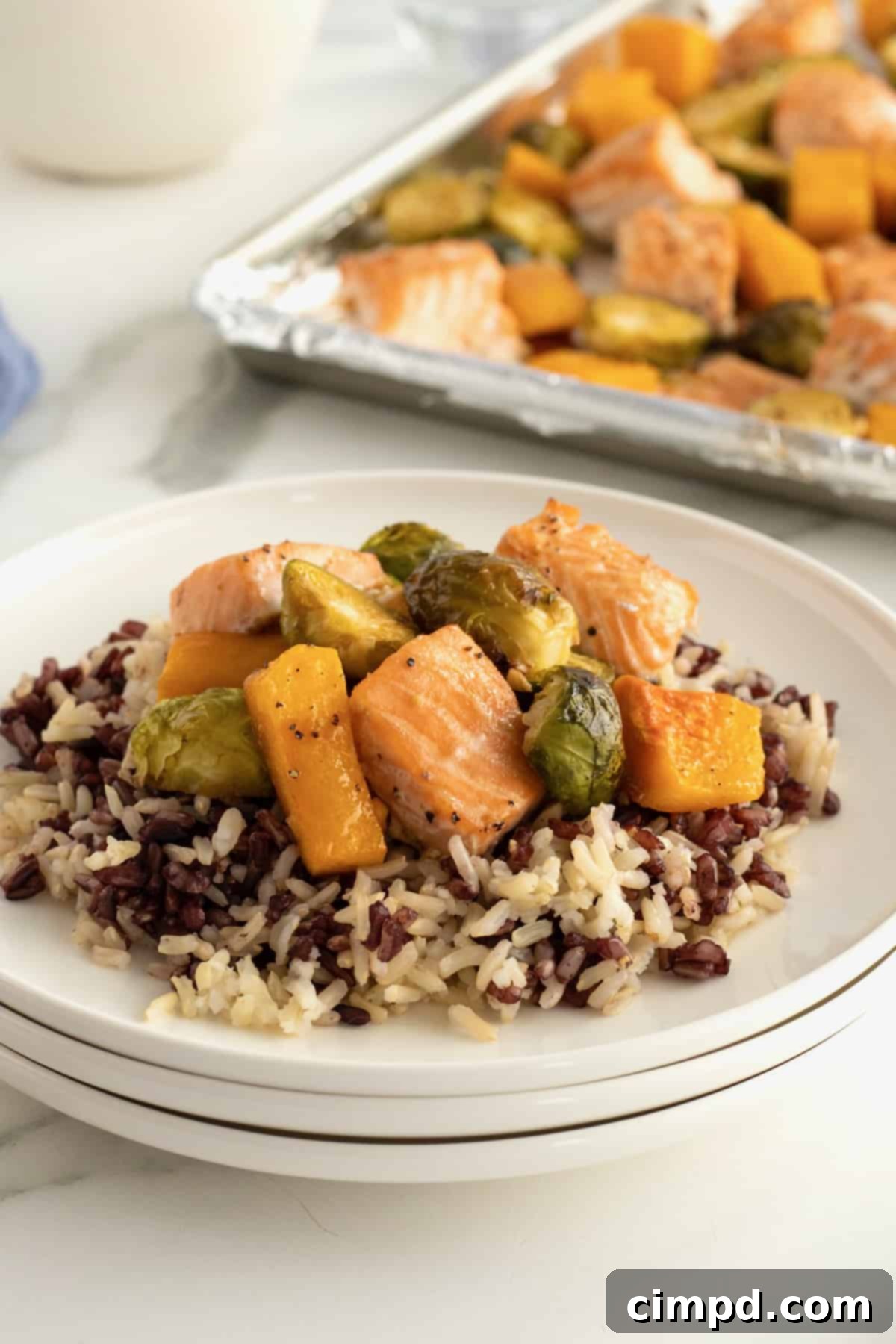 One Pan Salmon Bites with Roasted Vegetables 3 Sheet Pan Salmon Bites with Roasted Vegetables by The BakerMama