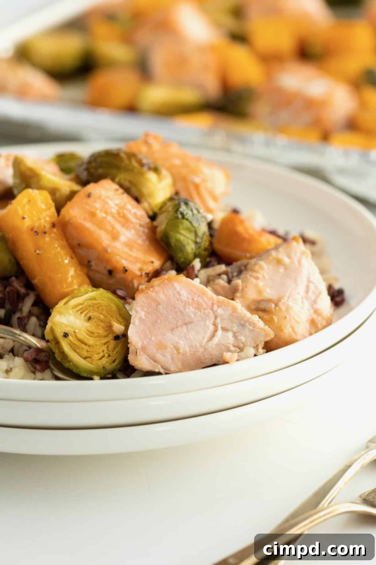 One Pan Salmon Bites with Roasted Vegetables 4 Sheet Pan Salmon Bites with Roasted Vegetables by The BakerMama